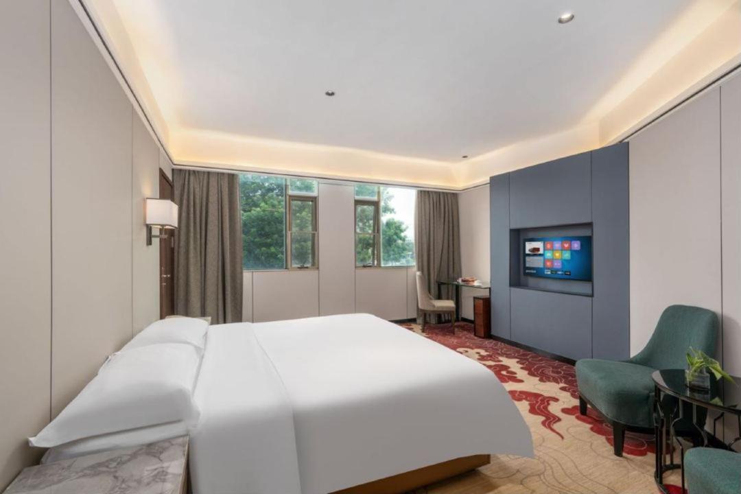 Mizparton Hotel South Qianjin Road Heshan  Exteriör bild